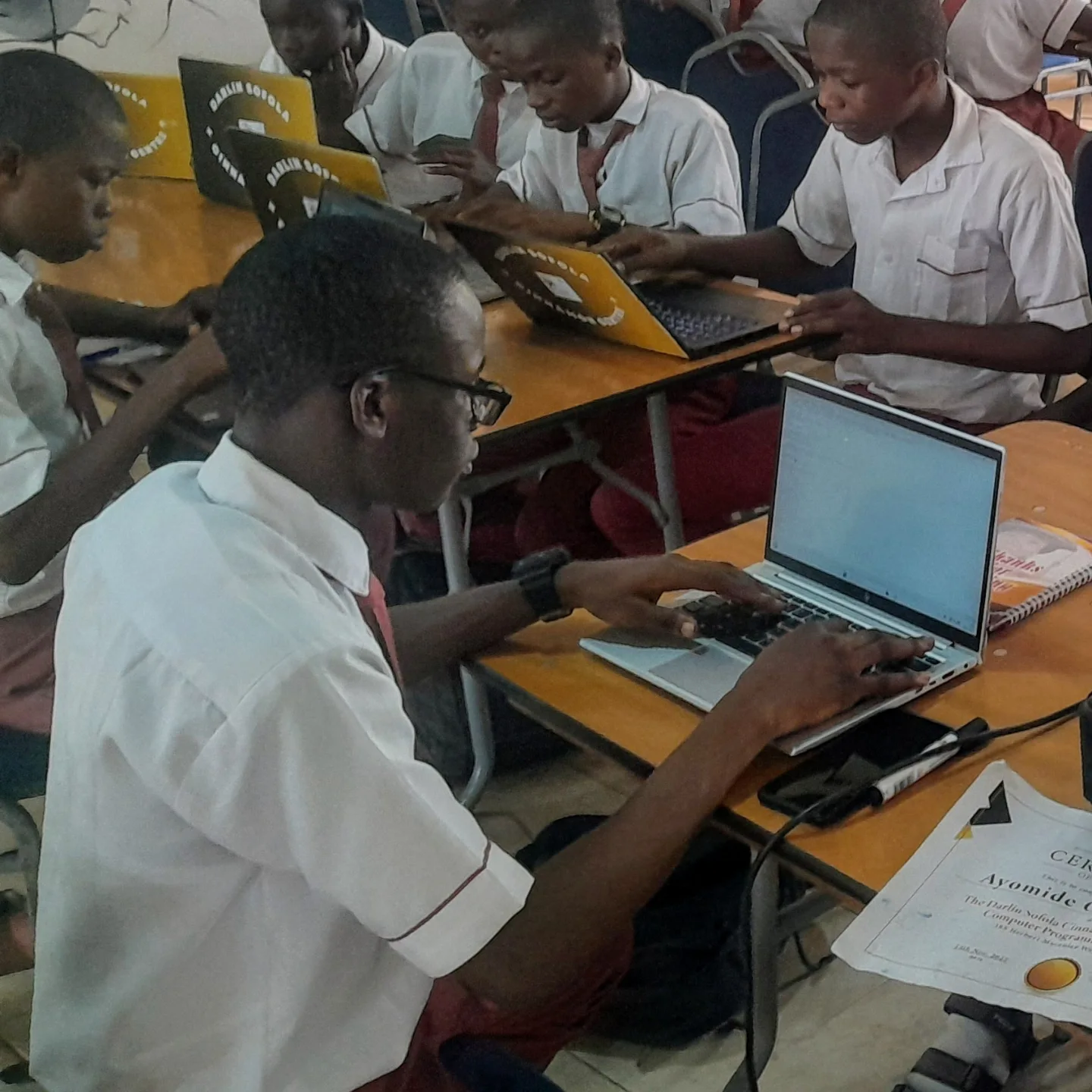 Students coding on computers